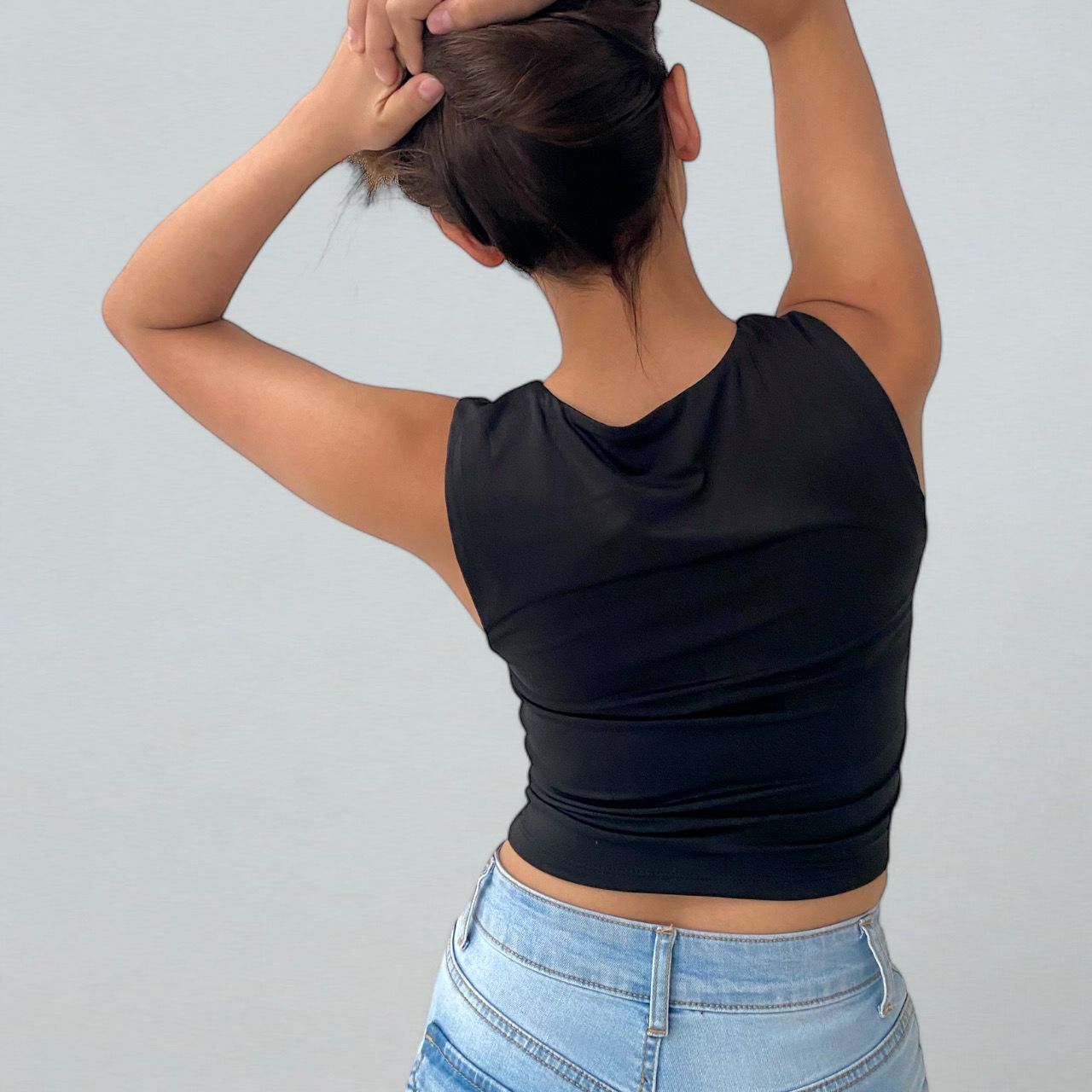 Blusa sin mangas cuello redondo